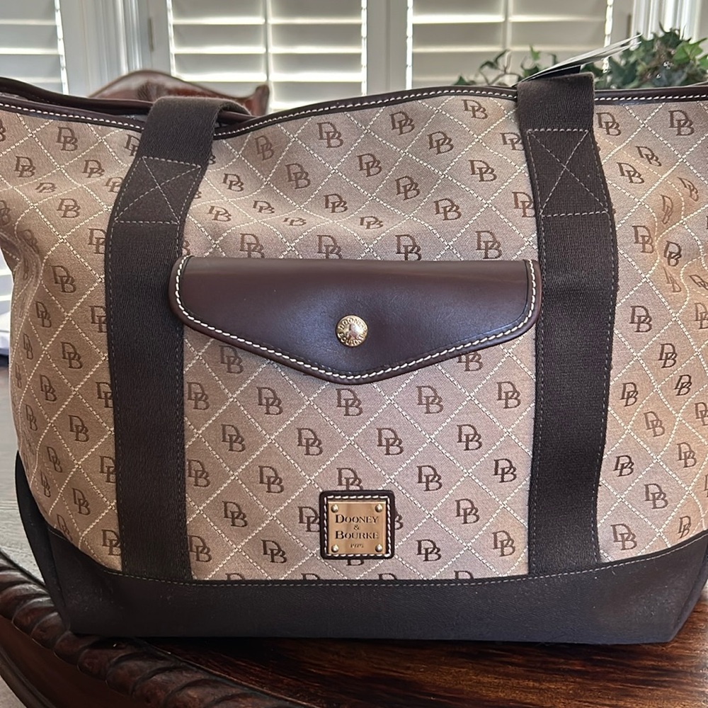 Dooney and Bourke beautiful never used Go 2 Tote!  Tonal light brown/dark brown